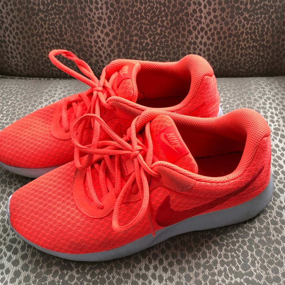 Neon orange Nikes